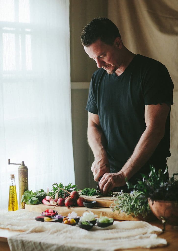 Chef Brian Etheredge of Private Maui Chef cutting vegetables.