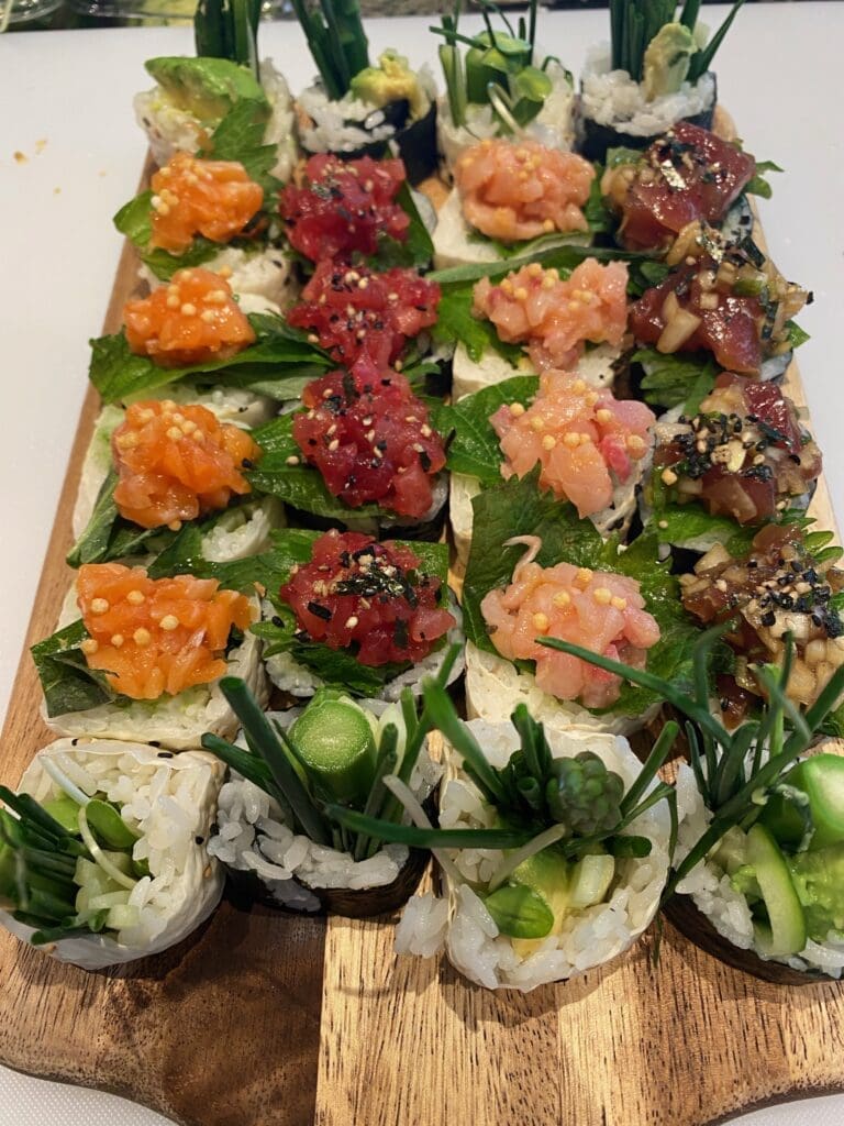 Veggie roll with assortment of Ahi, Salmon, and Hamachi poke